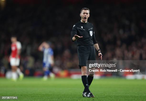 Referee Clement Turpin during the UEFA Champions League 2023/24 round of 16 second leg match between Arsenal FC and FC Porto at Emirates Stadium on...