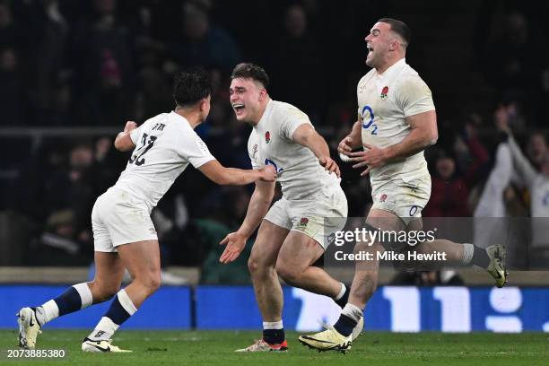 Theo Dan and Ben Earl of Englandcelebrates with Marcus Smith at the end of the Guinness Six Nations 2024 match between England and Ireland at...