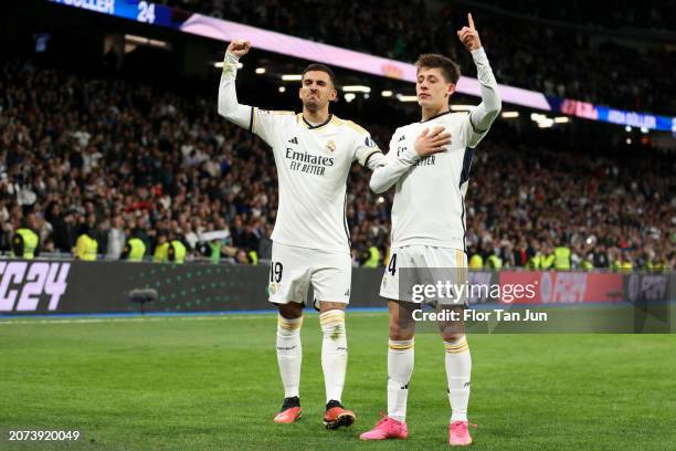 Arda Guler of Real Madrid CF celebrates with his teammate Daniel Ceballos after scoring the team's fourth goal during the LaLiga EA Sports match...