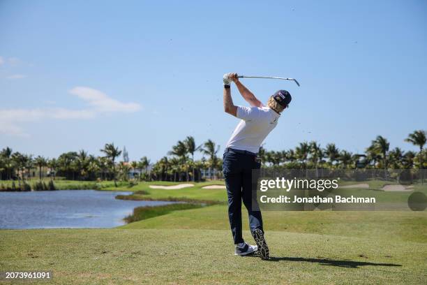 Jimmy Stanger of the United States plays his shot from the eighth tee during the final round of the Puerto Rico Open at Grand Reserve Golf Club on...