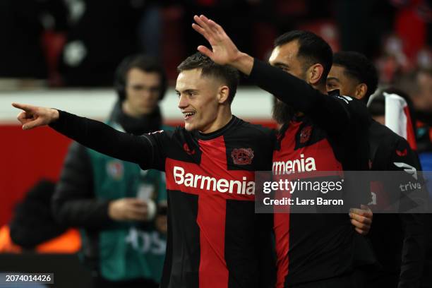 Florian Wirtz of Bayer Leverkusen celebrates scoring his team's second goal during the Bundesliga match between Bayer 04 Leverkusen and VfL Wolfsburg...