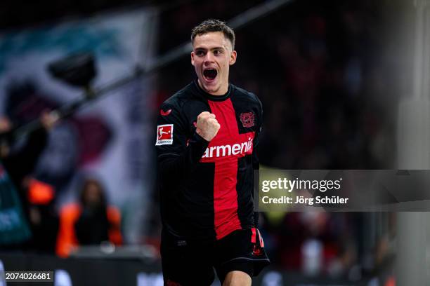 Florian Wirtz of Leverkusen celebrates after scoring his teams second goal during the Bundesliga match between Bayer 04 Leverkusen and VfL Wolfsburg...