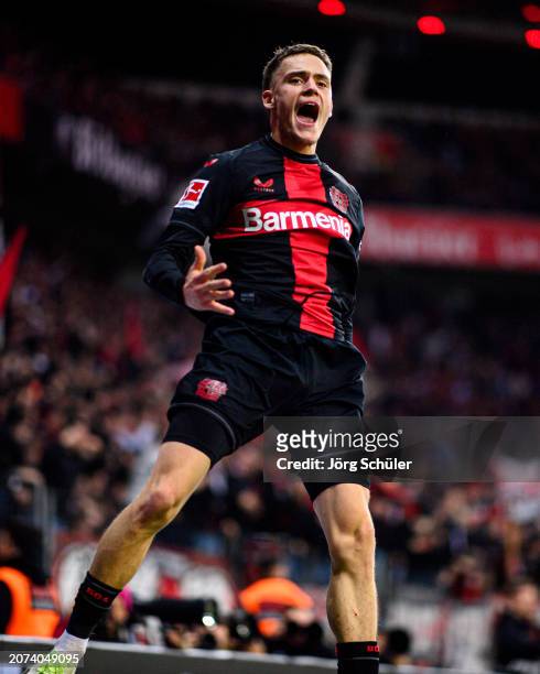 Florian Wirtz of Leverkusen celebrates after scoring his teams second goal during the Bundesliga match between Bayer 04 Leverkusen and VfL Wolfsburg...