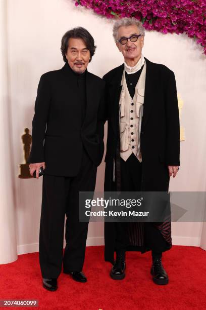 Kōji Yakusho and Wim Wenders attend the 96th Annual Academy Awards on March 10, 2024 in Hollywood, California.
