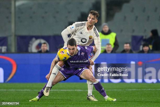 Diego Llorente of AS Roma and Andrea Belotti of ACF Fiorentina compete for the ball during the Serie A TIM match between ACF Fiorentina and AS Roma -...