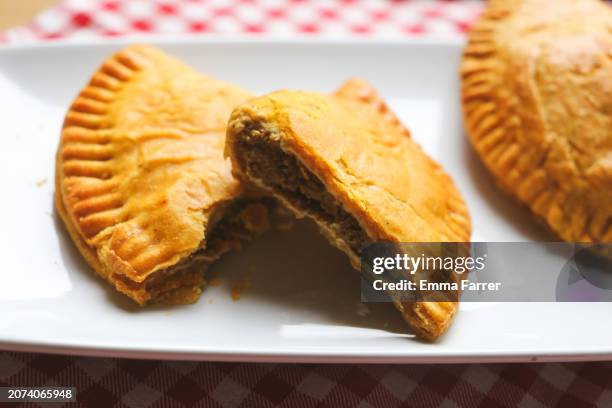 homemade jamaican patties - jamaican culture stock pictures, royalty-free photos & images
