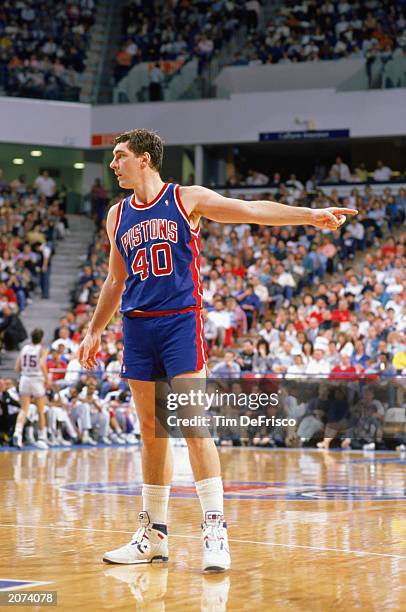 Bill Laimbeer of the Detroit Pistons points during a game against the Sacramento Kings at Arco Arena in Sacramento, California in the 1988-1989 NBA...