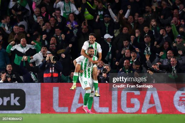 Willian Jose of Real Betis celebrates scoring his team's second goal with teammate Pablo Fornals during the LaLiga EA Sports match between Real Betis...