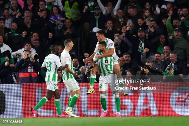 Willian Jose of Real Betis celebrates scoring his team's second goal with teammate Pablo Fornals during the LaLiga EA Sports match between Real Betis...