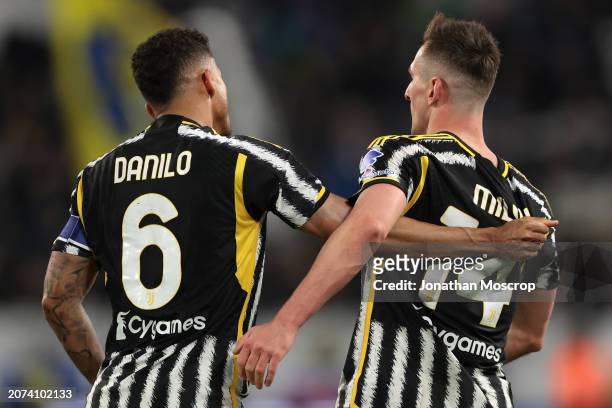 Arkadiusz Milik of Juventus is embraced by teammate Danilo after scoring to give their side a 2-1 lead during the Serie A TIM match between Juventus...