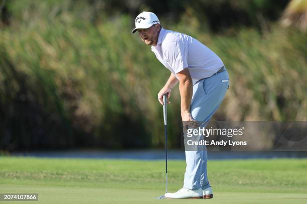 Brice Garnett of the United States reacts to his putt on the 17th green during the final round of the Puerto Rico Open at Grand Reserve Golf Club on...