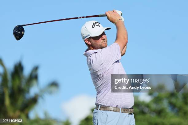 Brice Garnett of the United States plays his shot from the 18th tee during the final round of the Puerto Rico Open at Grand Reserve Golf Club on...