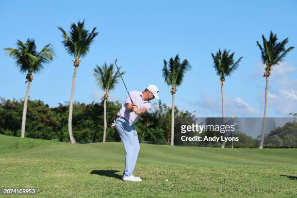 Brice Garnett of the United States plays his third shot on the 15th hole during the final round of the Puerto Rico Open at Grand Reserve Golf Club on...