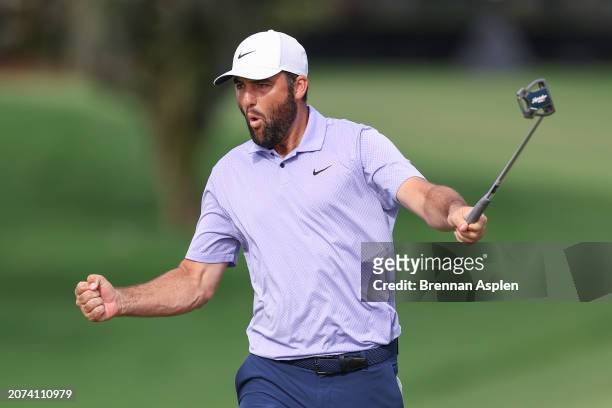 Scottie Scheffler of the United States reacts after making birdie on the 15th hole during the final round of the Arnold Palmer Invitational presented...
