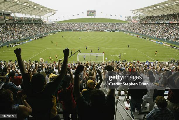 The crowds cheers after the Carlos Ruiz of the Los Angeles Galaxy scores against the Colorado Rapids during the inaugural match at the...
