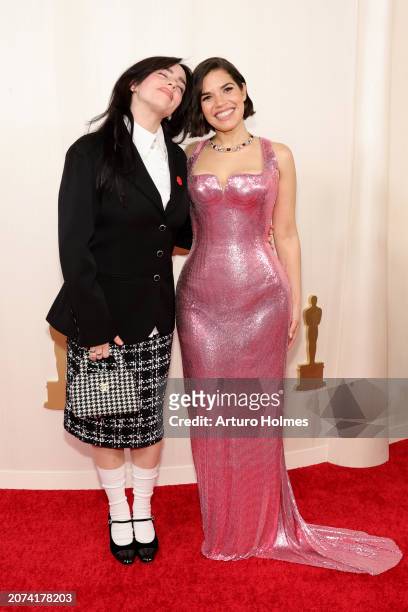 Billie Eilish and America Ferrera attend the 96th Annual Academy Awards on March 10, 2024 in Hollywood, California.