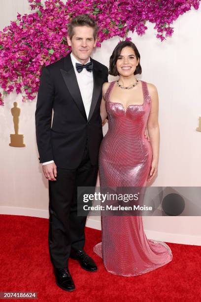 Ryan Piers Williams and America Ferrera attend the 96th Annual Academy Awards on March 10, 2024 in Hollywood, California.