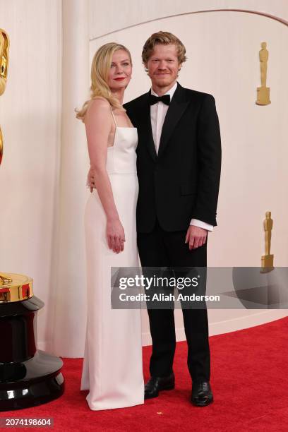 Kirsten Dunst and Jesse Plemons attend the 96th Annual Academy Awards on March 10, 2024 in Hollywood, California.