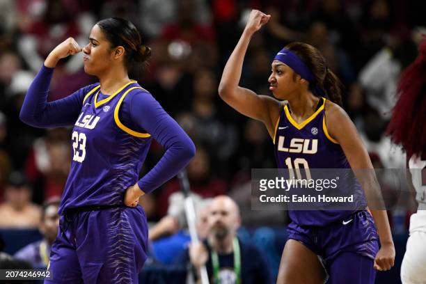 Aalyah Del Rosario of the LSU Lady Tigers celebrates with Angel Reese of the LSU Lady Tigers after a basket and foul against the South Carolina...