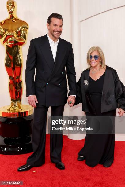 Bradley Cooper and Gloria Campano attend the 96th Annual Academy Awards on March 10, 2024 in Hollywood, California.