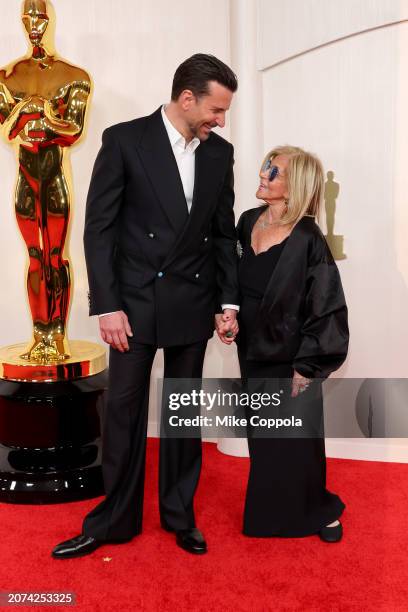 Bradley Cooper and Gloria Campano attend the 96th Annual Academy Awards on March 10, 2024 in Hollywood, California.