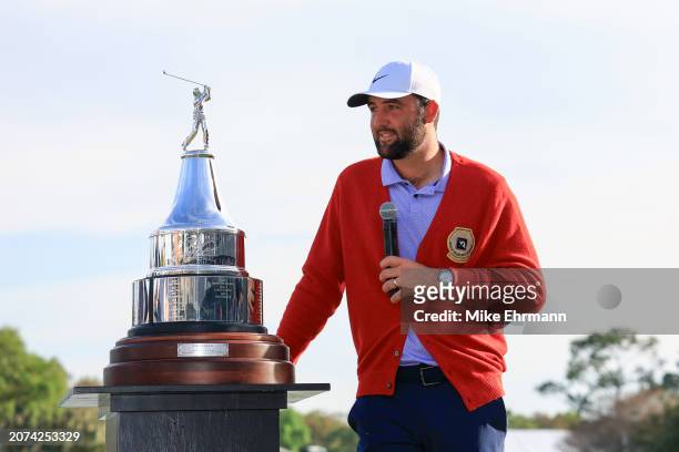 Scottie Scheffler of the United States poses with the trophy after winning the Arnold Palmer Invitational presented by Mastercard at Arnold Palmer...