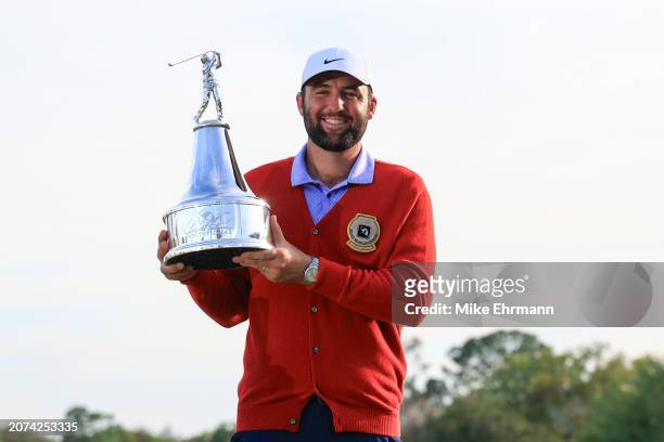 Scottie Scheffler of the United States poses with the trophy after winning the Arnold Palmer Invitational presented by Mastercard at Arnold Palmer...