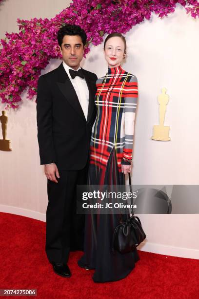 Karim Saleh and Andrea Riseborough attend the 96th Annual Academy Awards on March 10, 2024 in Hollywood, California.