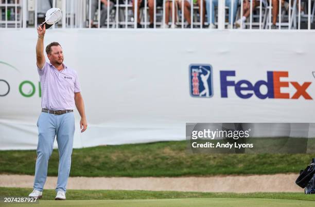 Brice Garnett of the United States celebrates his win on the 18th green, the fourth-playoff hole, against Erik Barnes of the United States, during...
