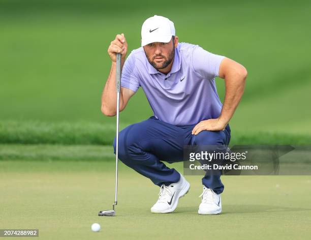 Scottie Scheffler of The United States lines up a putt for birdie on the 15th hole during the final round of the Arnold Palmer Invitational presented...