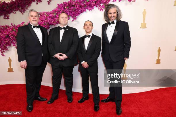Guy Williams, Stephane Ceretti, Theodore Bialek and Alexis Wajsbrot attend the 96th Annual Academy Awards on March 10, 2024 in Hollywood, California.