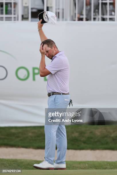 Brice Garnett of the United States celebrates his win on the 18th green, the fourth-playoff hole, against Erik Barnes of the United States, during...