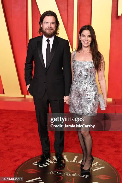 Jason Bateman and Amanda Anka attend the 2024 Vanity Fair Oscar Party Hosted By Radhika Jones at Wallis Annenberg Center for the Performing Arts on...