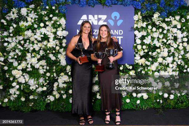 Suzie Bates poses with the Ruth Martin Cup for women's domestic batting and Emma Black poses with the Women's Domestic Player of the Year trophy and...