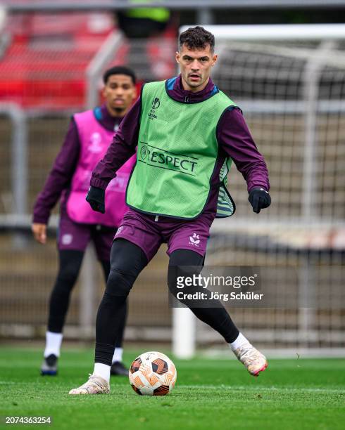 Granit Xhaka of Leverkusen controls the ball during the UEFA Europa League 2023/24 round of 16 second leg training and press conference at on March...