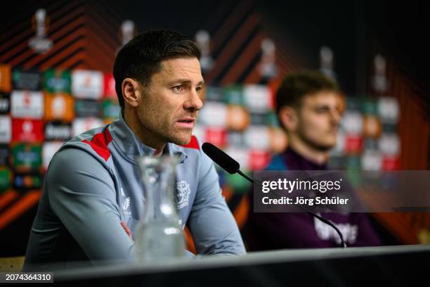 Headcoach Xabi Alonso and Josip Stanisic during the UEFA Europa League 2023/24 round of 16 second leg press conference at on March 13, 2024 in...