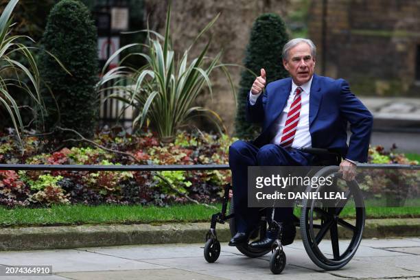 Texas Governor Greg Abbott arrives in Downing Street, central London, on March 13, 2024 to meet with Britain's Business and Trade Secretary, and...