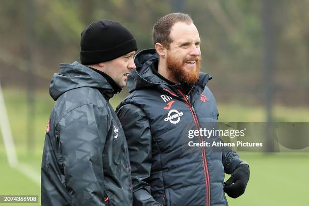 Coach Patrick Orme speaks with Ryan Harley, assistant head coach during the Swansea City Training Session at The Fairwood Training Ground on March...