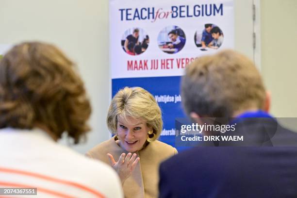 Queen Mathilde of Belgium pictured during a royal visit to a workshop of 'Teach for Belgium' at the GO!4cITy secondary school in Sint-Jans-Molenbeek...