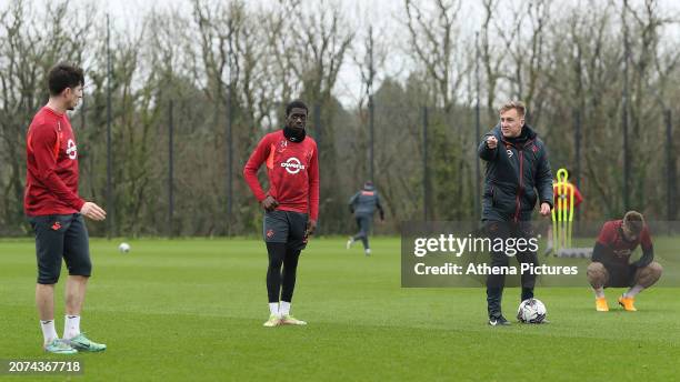 Coach George Lawter to Josh Key, Charles Sagoe Jr and Andy Fisher gives instructions during the Swansea City Training Session at The Fairwood...