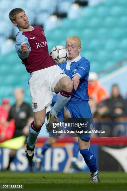 February 22: Mikael Forssell of Birmingham City and Thomas Hitzlsperger of Aston Villa challenge during the Premier League match between Aston Villa...