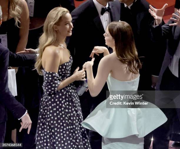 Jennifer Lawrence and Emma Stone in the audience during the 96th Annual Academy Awards at Dolby Theatre on March 10, 2024 in Hollywood, California.