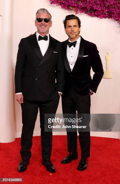 Simon Halls and Matt Bomer attend the 96th Annual Academy Awards on March 10, 2024 in Hollywood, California.