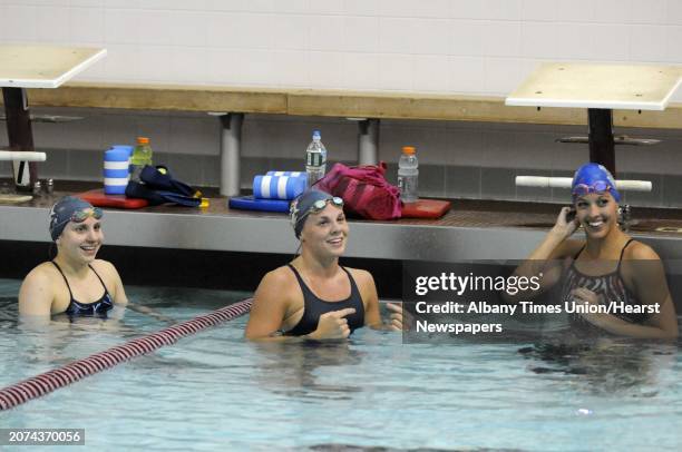 Amy Bopp of Clifton Park, left,Kathryn Rowe of Glenville and Jenna Bickel, of Guilderland, right, are three of six local swimmers that will be...