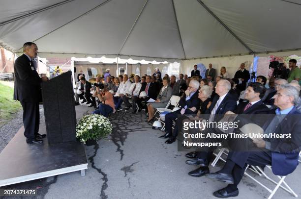 James W. Connolly, left, President and Chief Executive Officer of Ellis Medicine, speaks during a ground breaking ceremony for the new Golub Center...