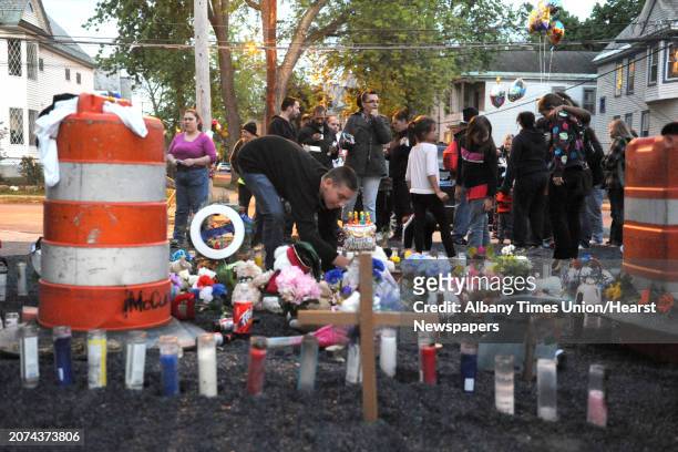 Family, friends and neigbors attend a vigil for Donavan Duell, the youngest victim of Schenectady fatal fire, on what would have his first birthday...