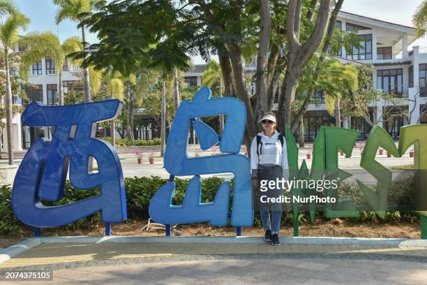 Tourists are visiting the West Island in Sanya, South China's Hainan province, on December 31, 2020.