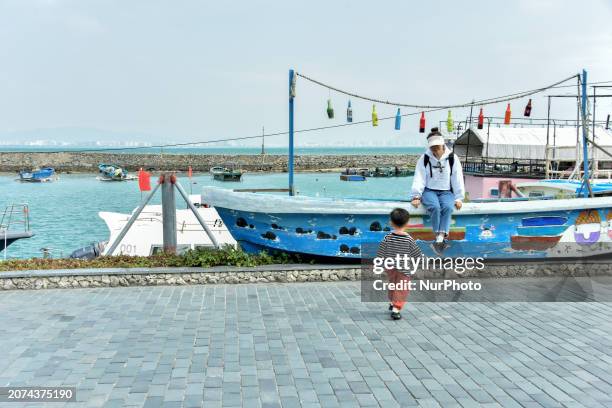 Tourists are visiting the West Island in Sanya, South China's Hainan province, on December 31, 2020.