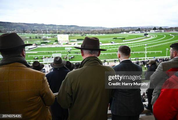 Gloucestershire , United Kingdom - 13 March 2024; Trainer Willie Mullins, centre, watches the Weatherbys Champion Bumper, where he had his hundreth...