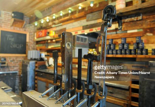 Vintage tools used as draft pulls at Kevin Blodgett's new bar called The Shop on Friday Oct. 10, 2014 in Troy, N.Y. A 35,000-square-foot Troy...